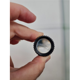 Plastic magnifying glass (15x zoom) with a transparent base for viewing windshield impact at VBSA